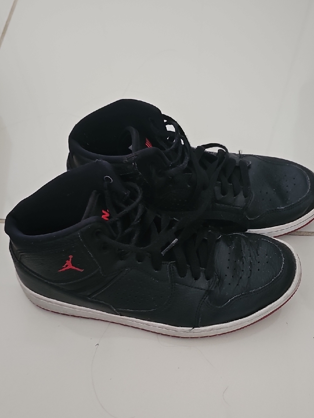 Jordan Black High-Top Sneakers with Red Accents